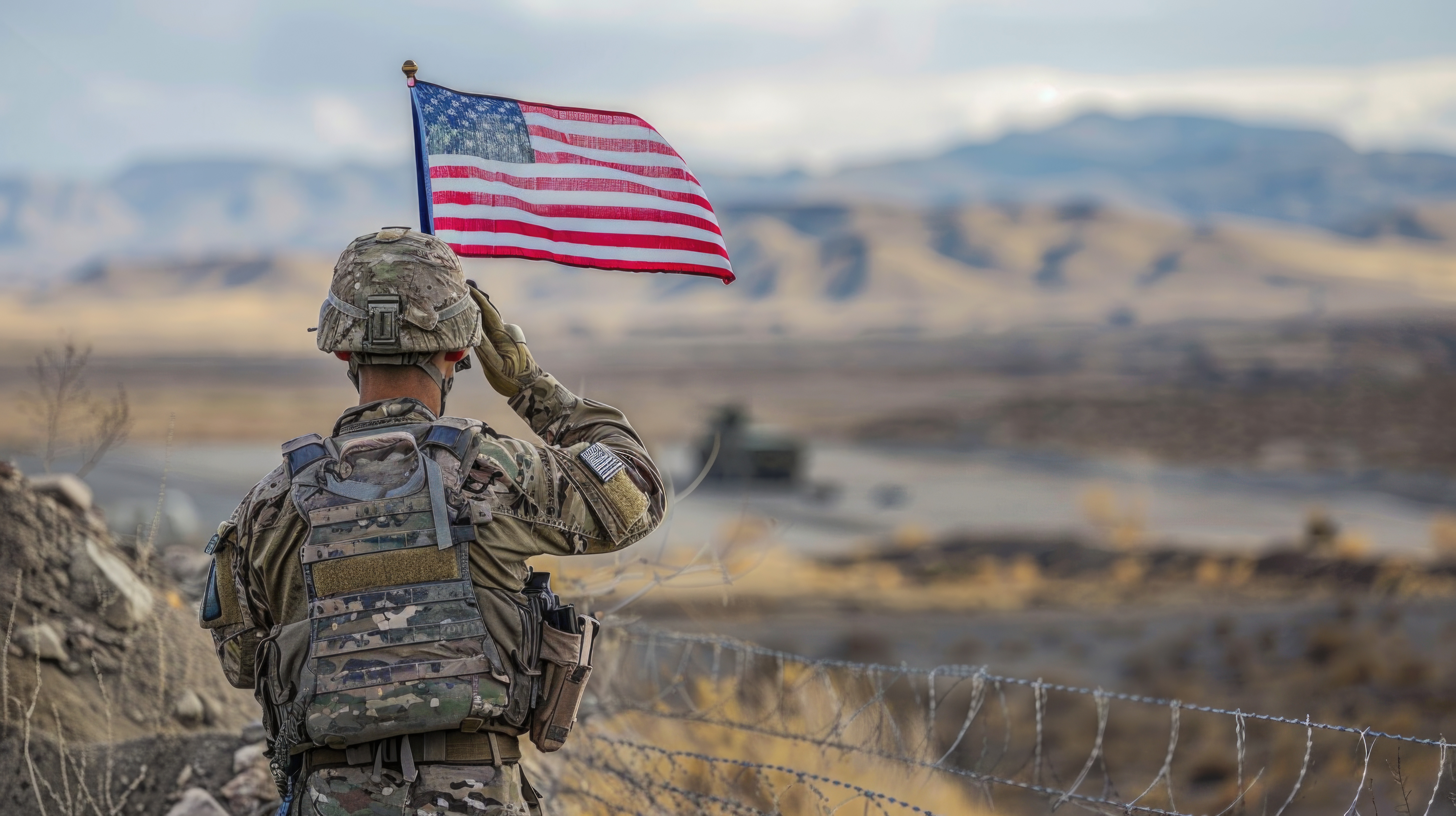 Soldier saluting the American flag