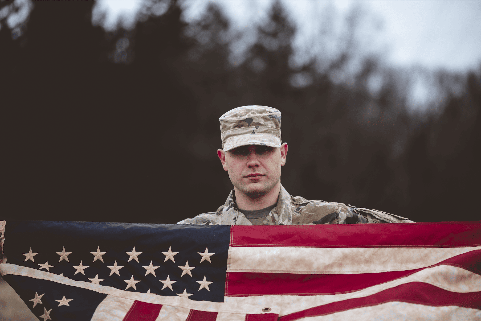 Veteran holding the American flag